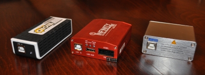 Some of the flasher boxes, showing USB connection to workstation.